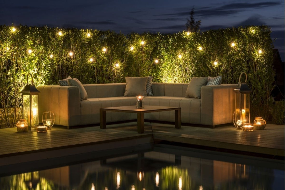 Garden Sofa With lighting In The Evening 