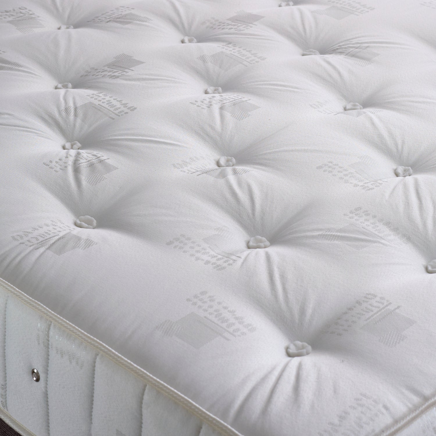 Bedmaster Promo Mattress Tufts And Cover Close Up-Better Bed Company 